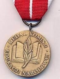 Photo presents the National Education Comittee Medal for Jakub Gac